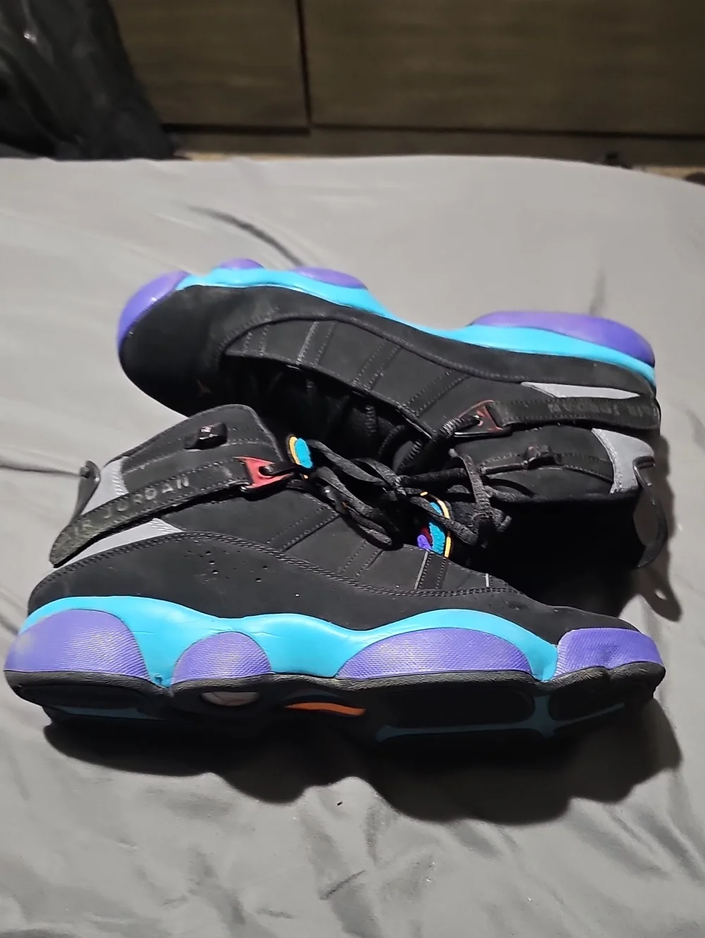 Jordan Men’s Black with Teal, Purple & Pink Accents Basketball Shoes